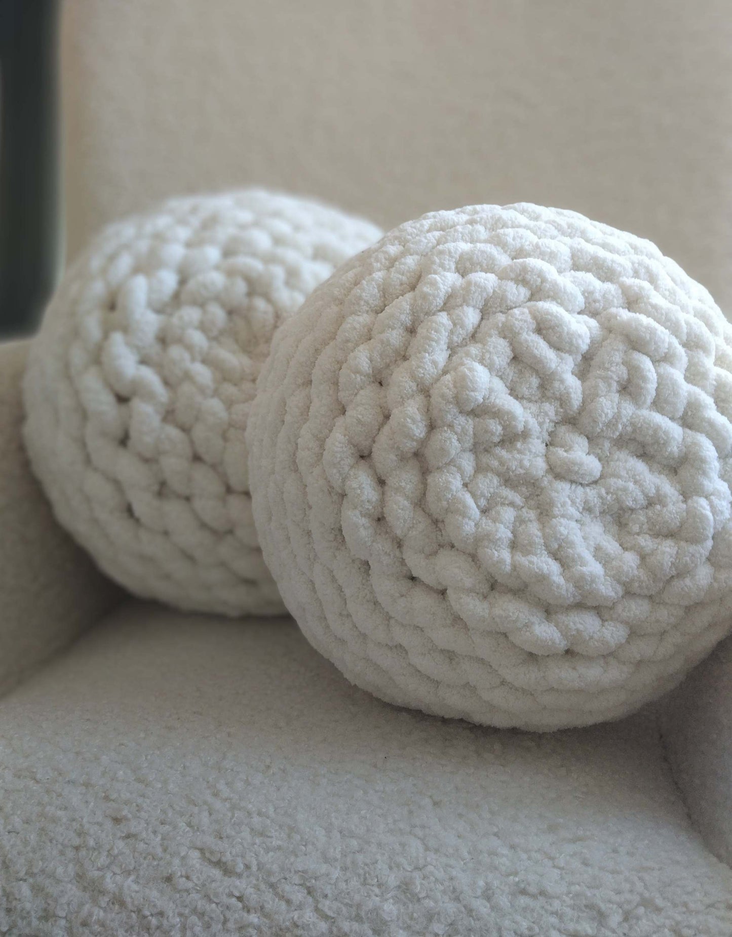  2 hand knit round cushions in super soft chunky chenille yarn cream