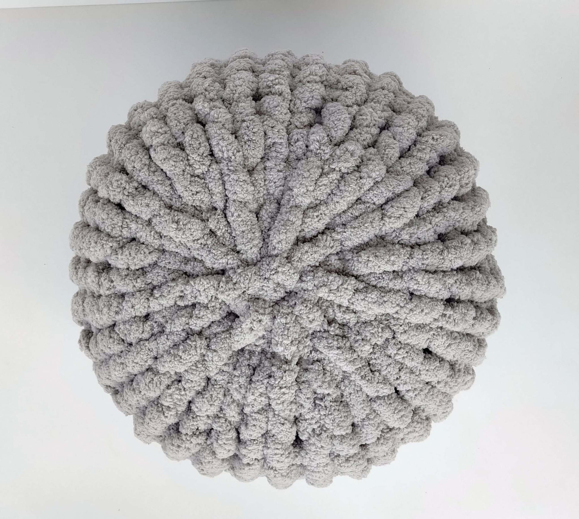 2 hand knit round cushions in super soft chunky chenille yarn grey