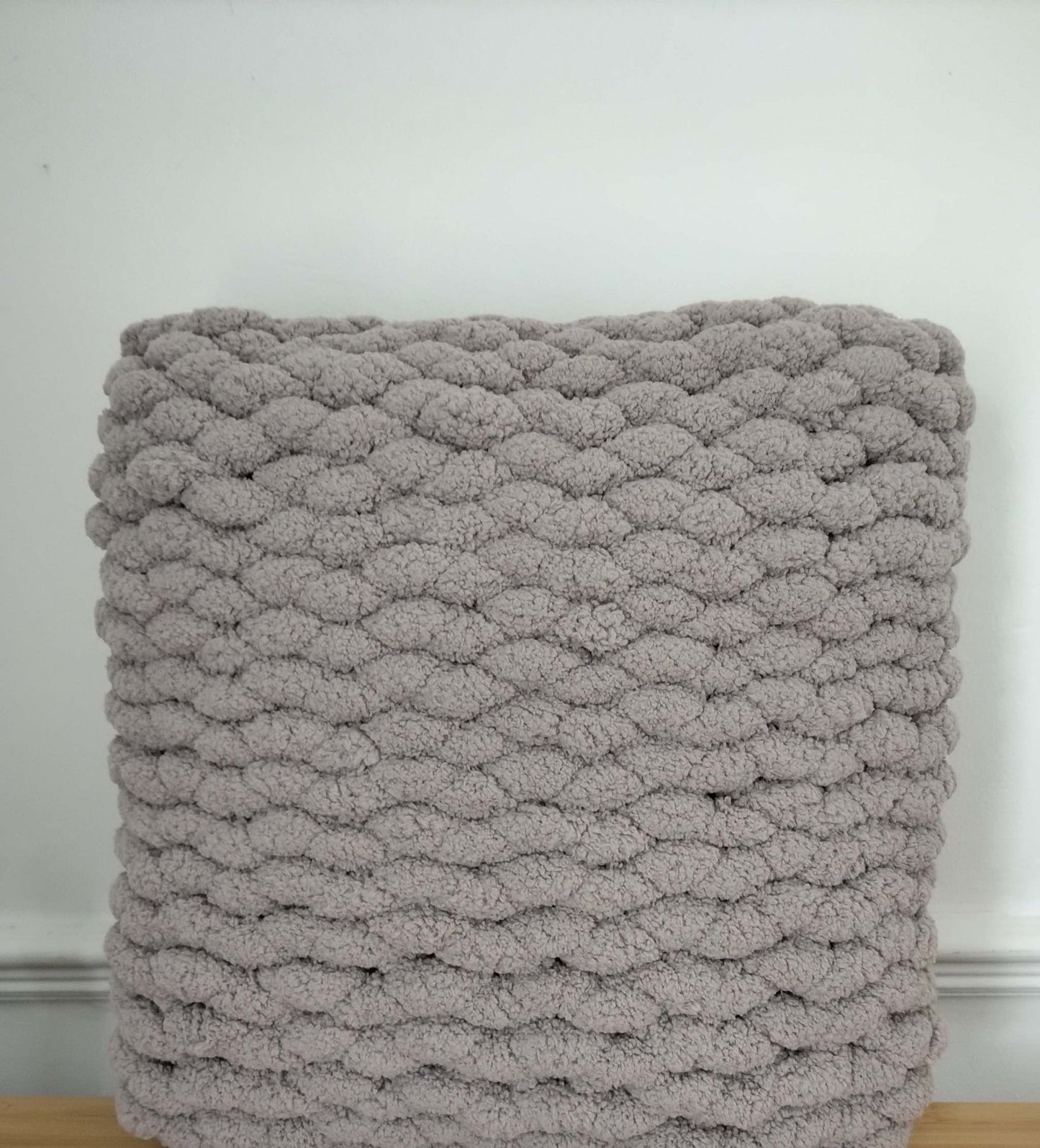 chunky hand knitted cushion - square